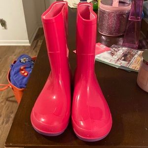 Pink and purple sparkly rain boots